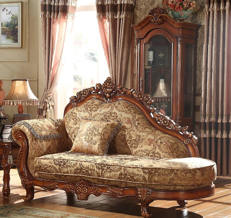 Decorative sofa with floral pattern in a room with curtains and a lamp.