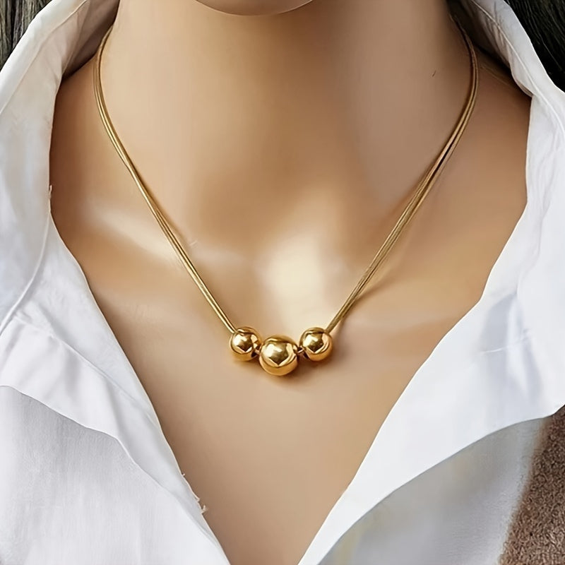 Elegant Golden Spherical Pendant Necklace