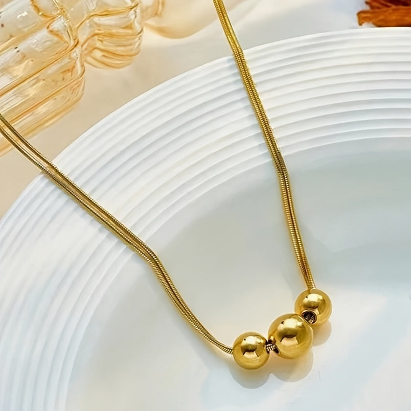 Elegant Golden Spherical Pendant Necklace