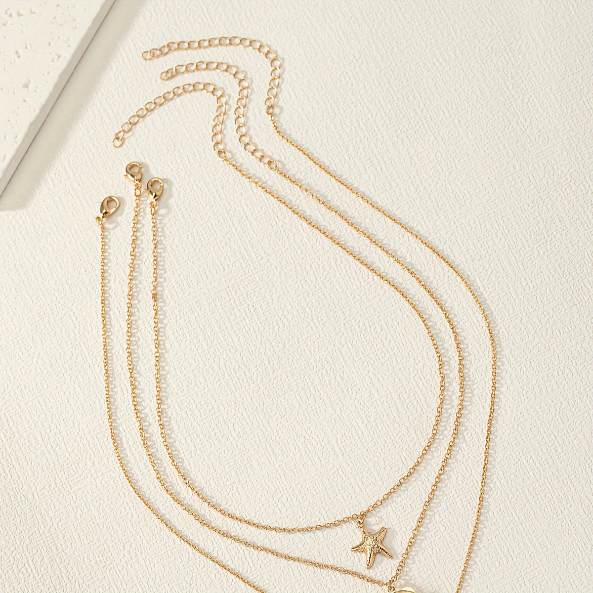 Ocean Charm 3-Piece Necklace Set with Shell, Starfish & Faux Pearl Pendants – Perfect for Summer Style & Casual Looks