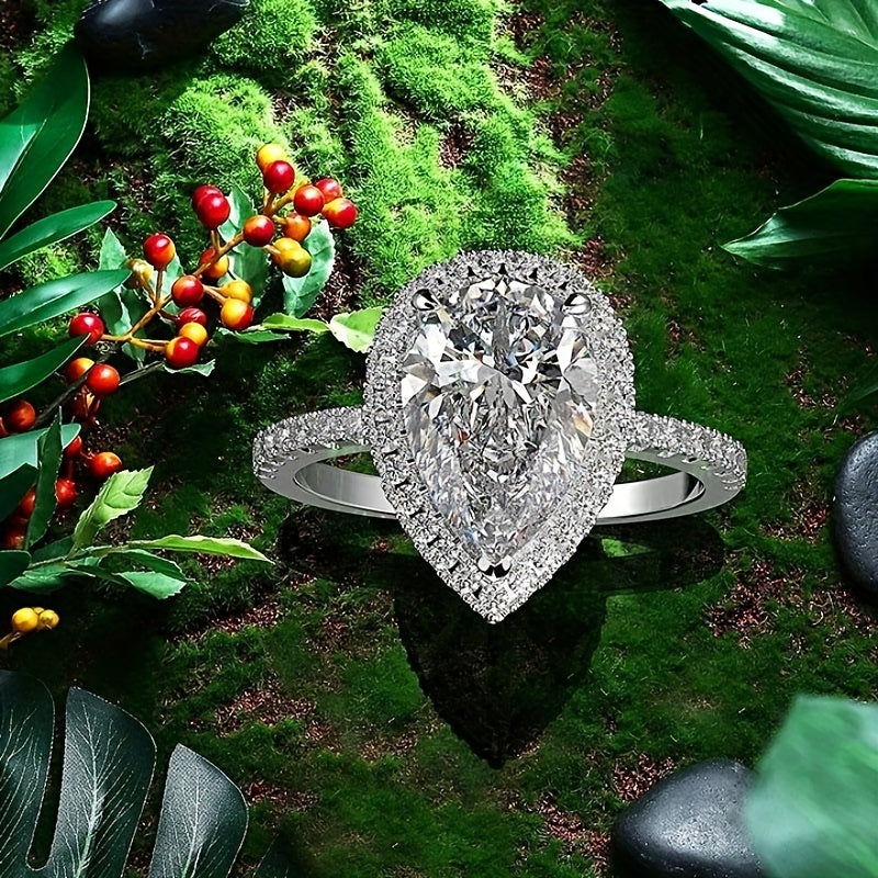 Glittering teardrop-shaped simulation diamond ring