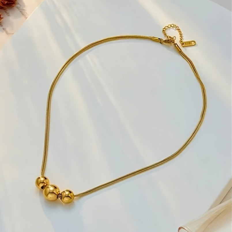 Elegant Golden Spherical Pendant Necklace