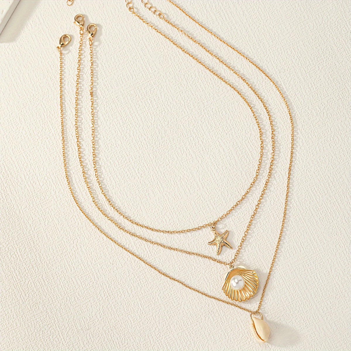 Ocean Charm 3-Piece Necklace Set with Shell, Starfish & Faux Pearl Pendants – Perfect for Summer Style & Casual Looks