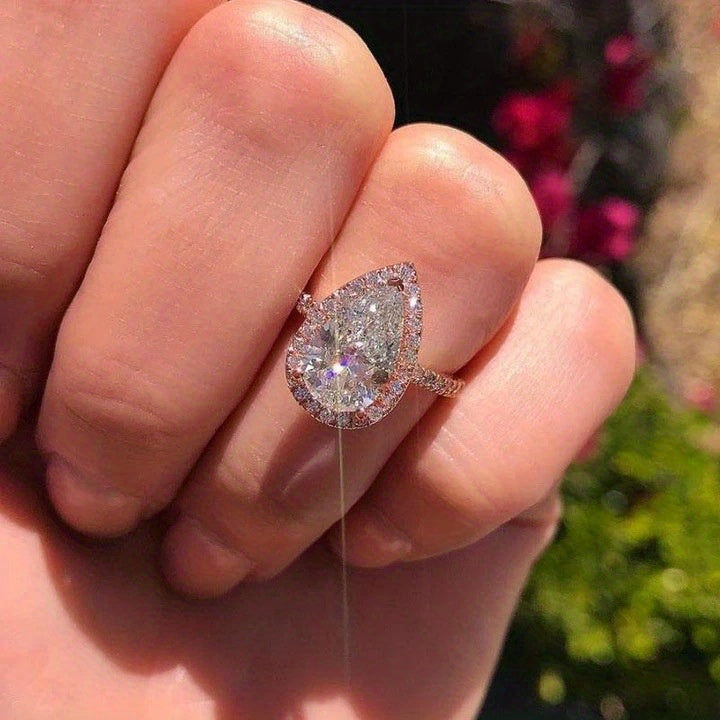 Glittering teardrop-shaped simulation diamond ring