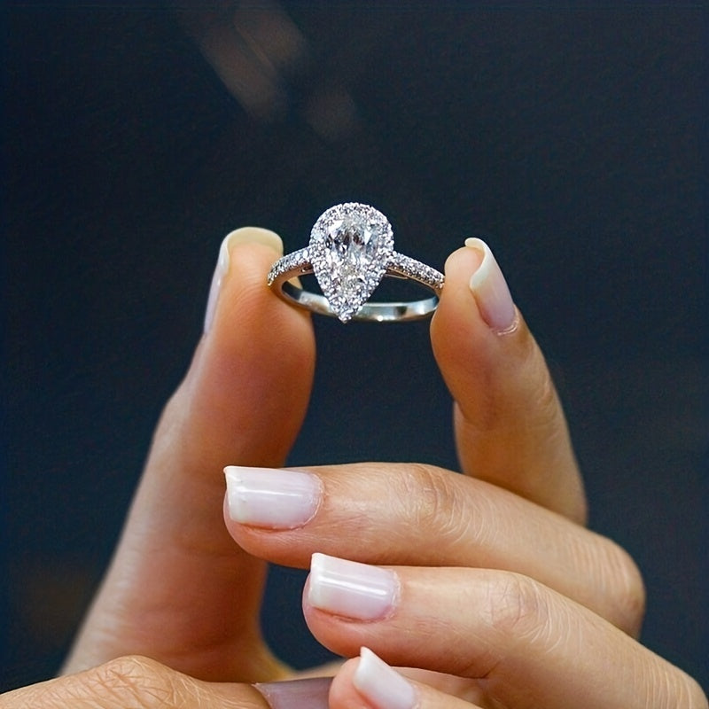 Glittering teardrop-shaped simulation diamond ring