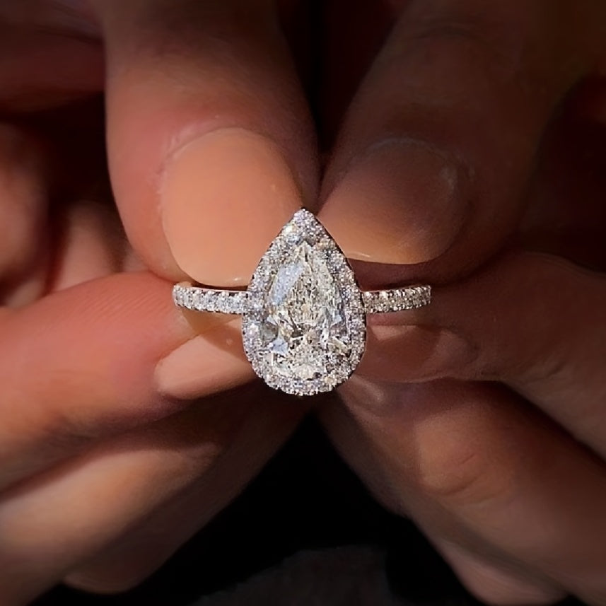 Glittering teardrop-shaped simulation diamond ring