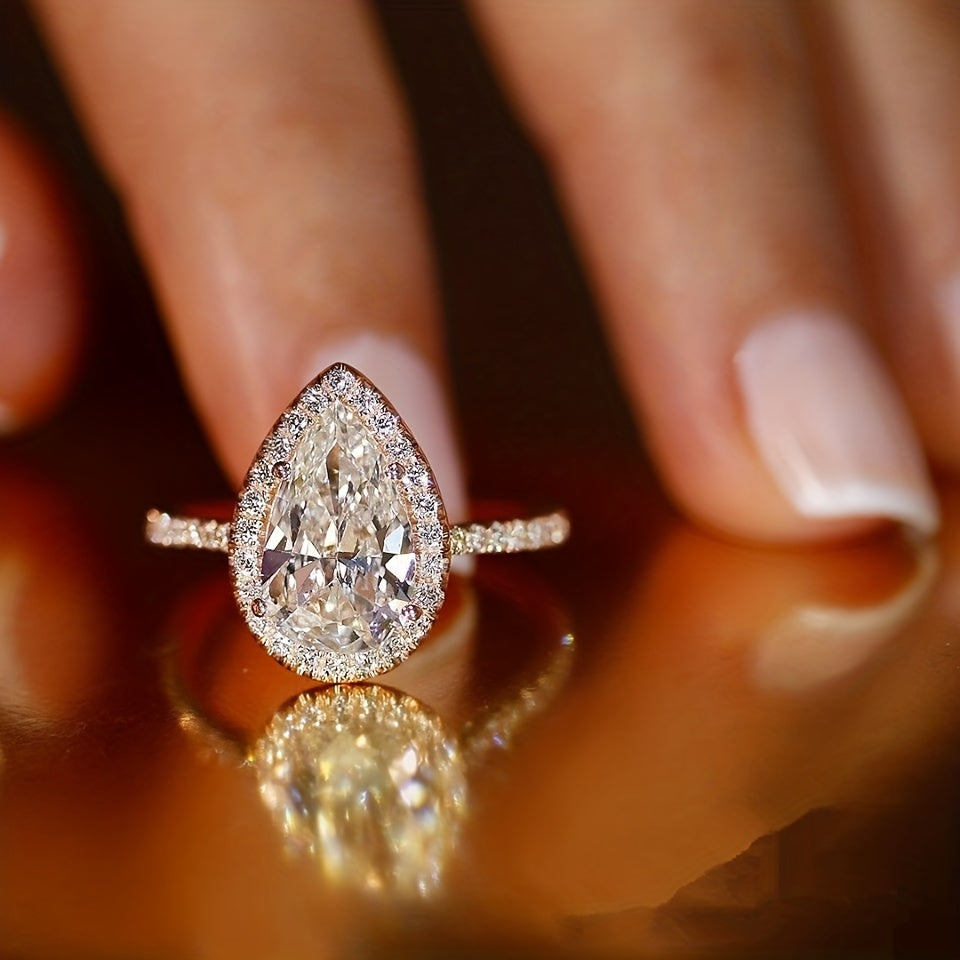 Glittering teardrop-shaped simulation diamond ring